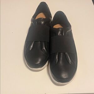 UGG  Leather Black and White Slip-On Sneakers